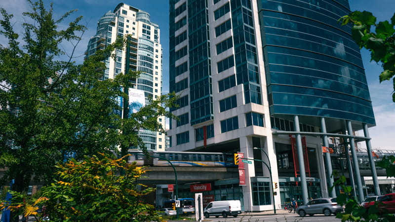 A train entering Main Street-Science World Station